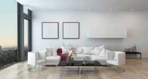 interior of an urban condominium with a white sofa and low coffee table